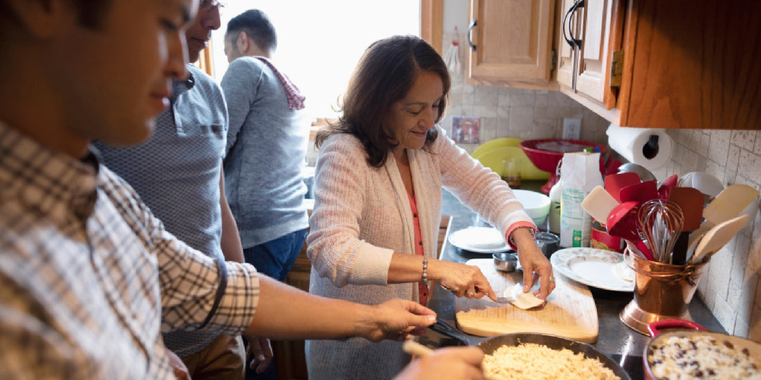 A Latino family making dinner together